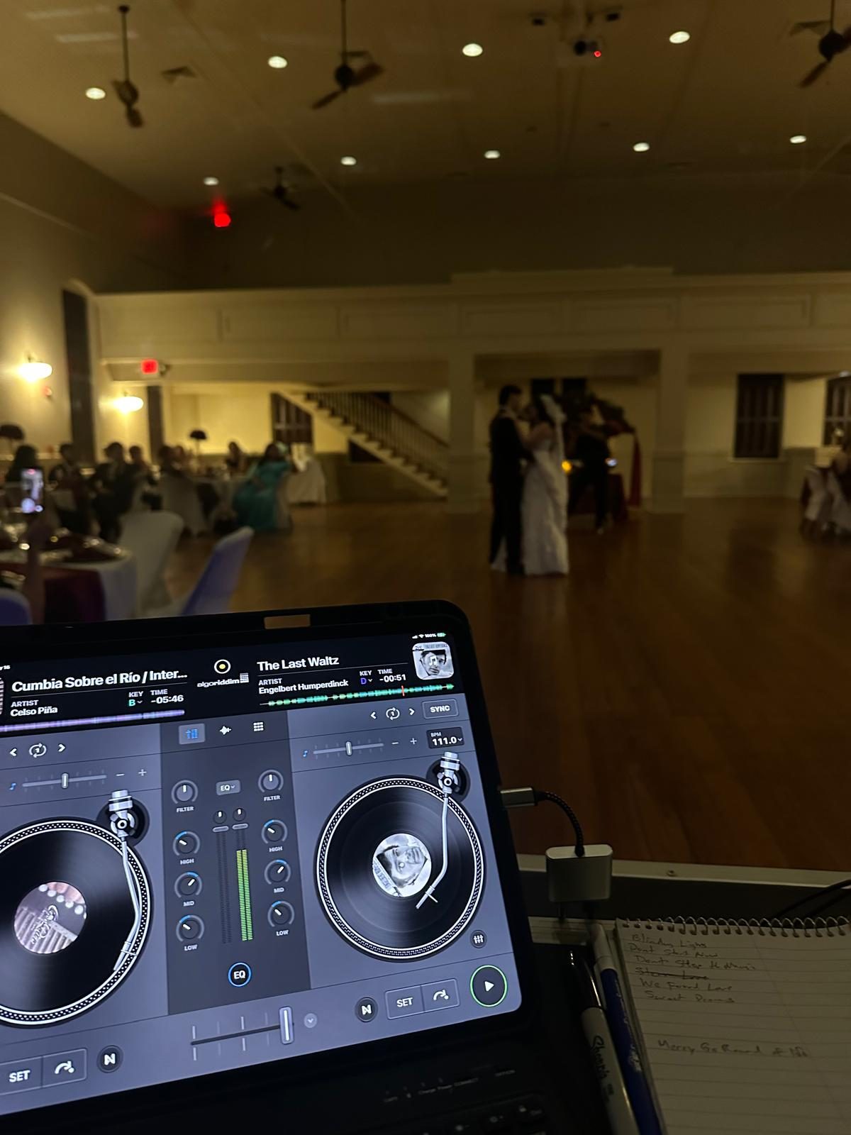 DJ Volts working the booth at a live event